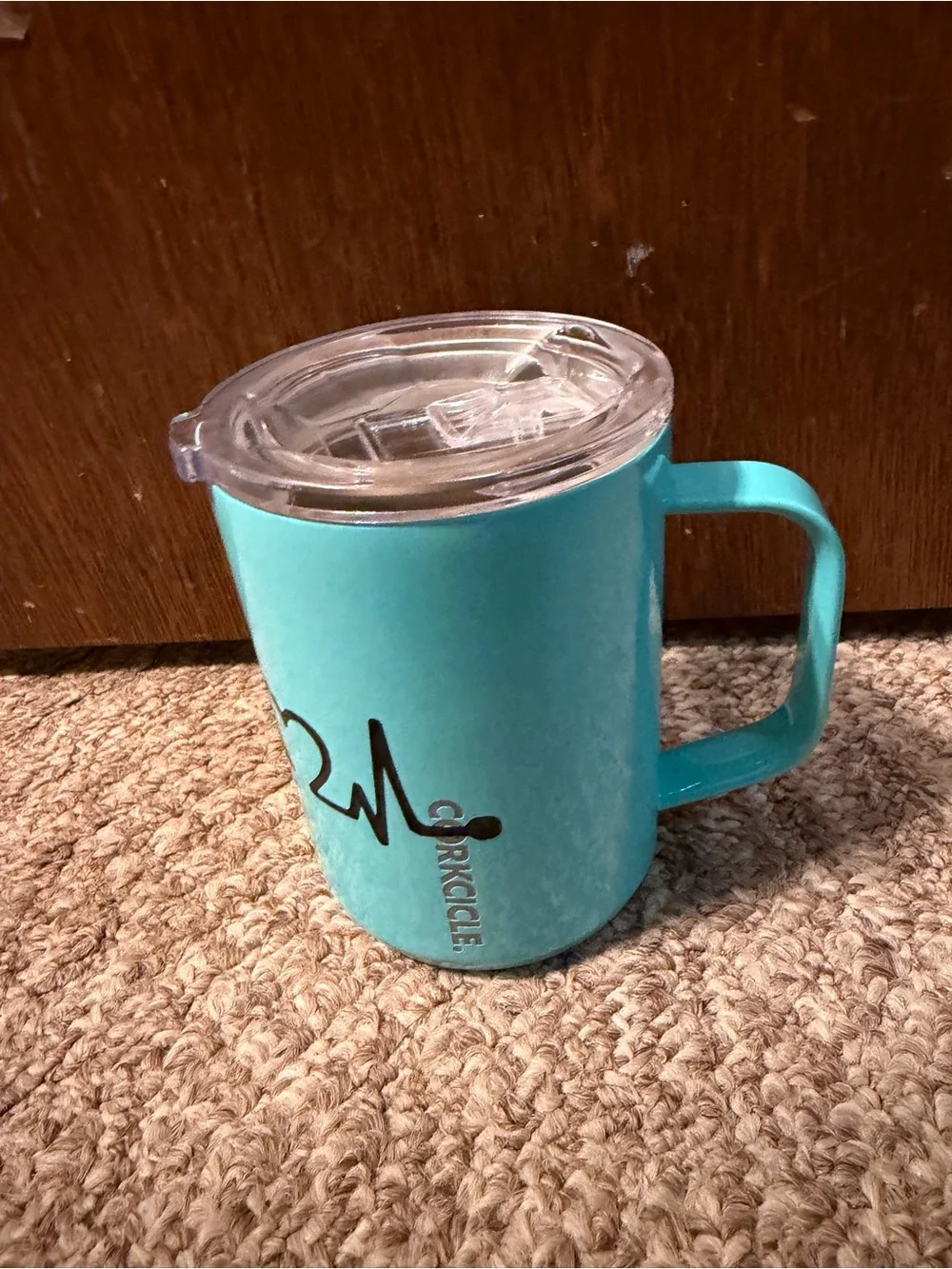Corkcicle coffee tumbler with camper design.